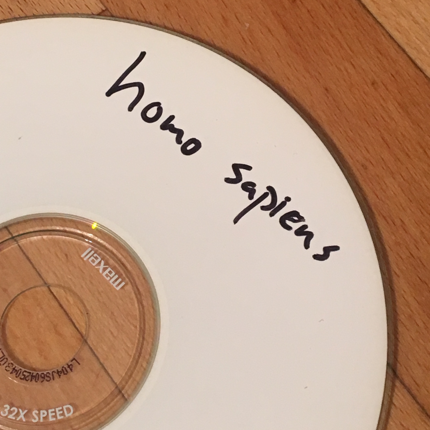 CD-R with 'homo sapiens' written on it